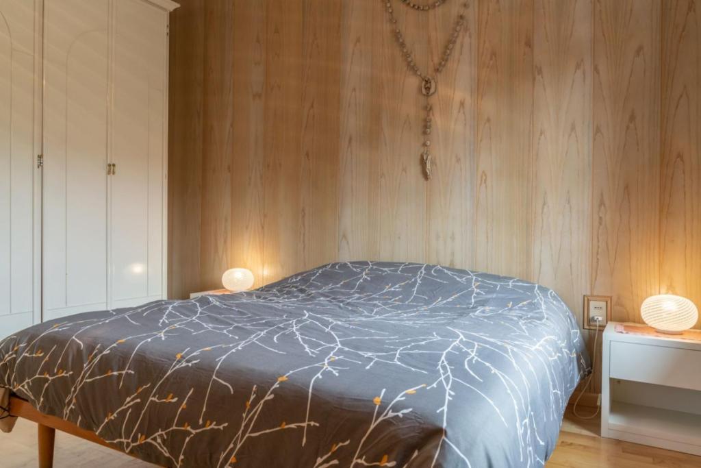 Postel nebo postele na pokoji v ubytování Casa ai Tre Colli, Tres