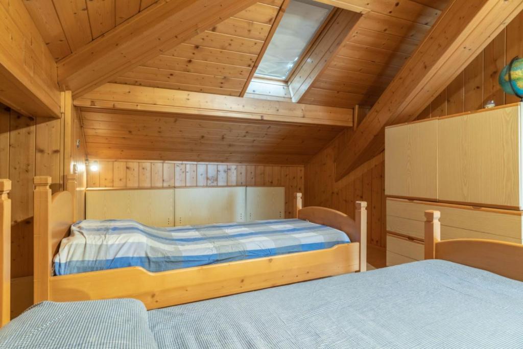 Postel nebo postele na pokoji v ubytování Casa ai Tre Colli, Tres