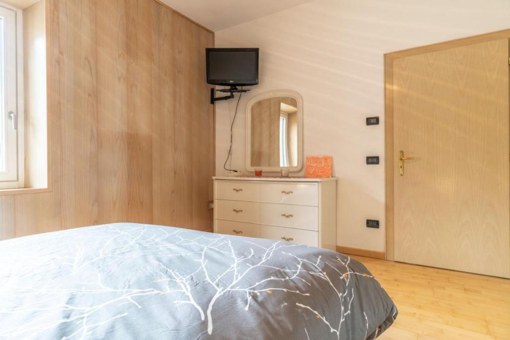 Postel nebo postele na pokoji v ubytování Casa ai Tre Colli, Tres