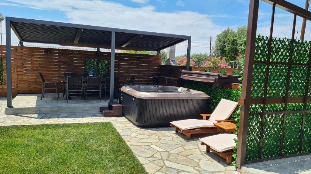 Κήπος έξω από το OASIS BEACH HOUSE