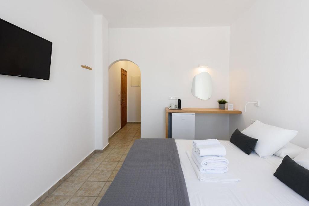 Postel nebo postele na pokoji v ubytování Hotel Bilia