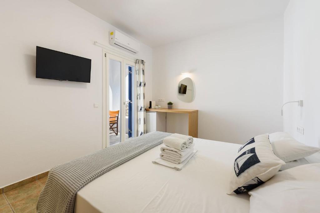Postel nebo postele na pokoji v ubytování Hotel Bilia