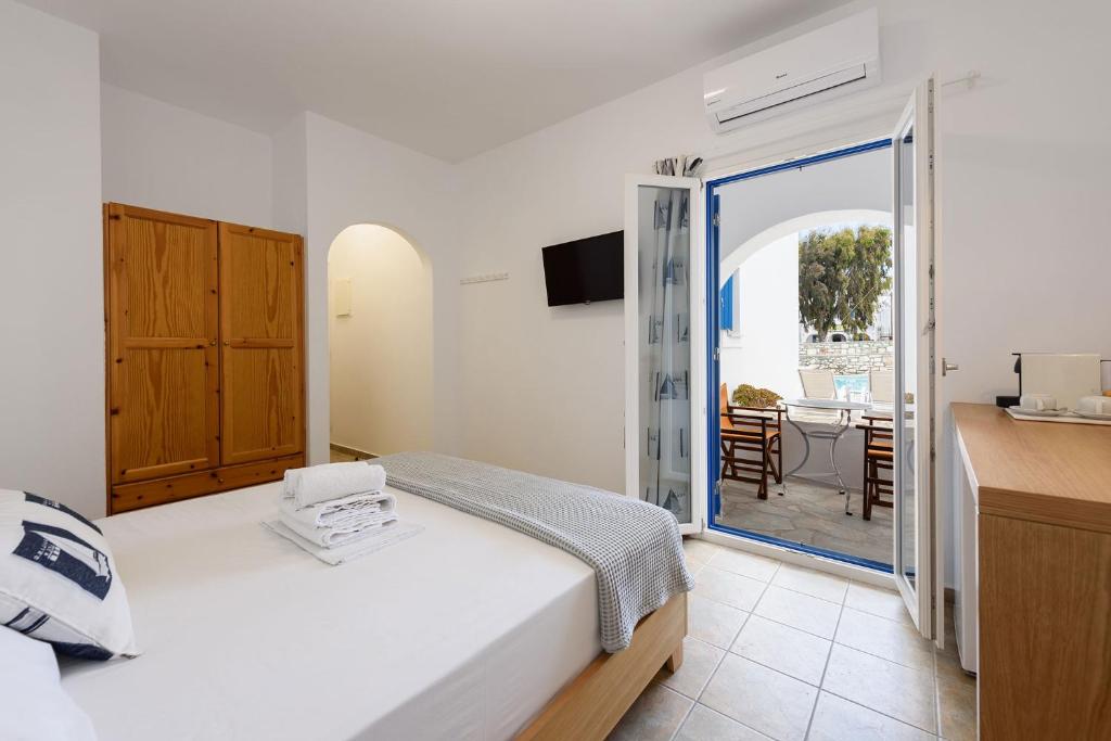 Postel nebo postele na pokoji v ubytování Hotel Bilia