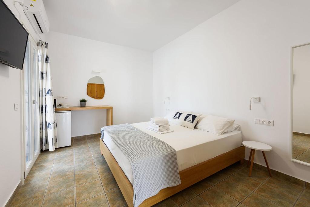 Postel nebo postele na pokoji v ubytování Hotel Bilia