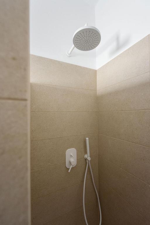 Koupelna v ubytování Hotel Bilia