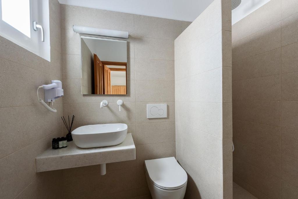 Koupelna v ubytování Hotel Bilia