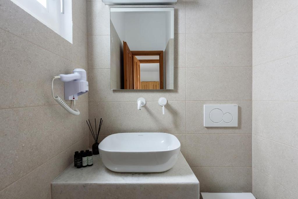 Koupelna v ubytování Hotel Bilia