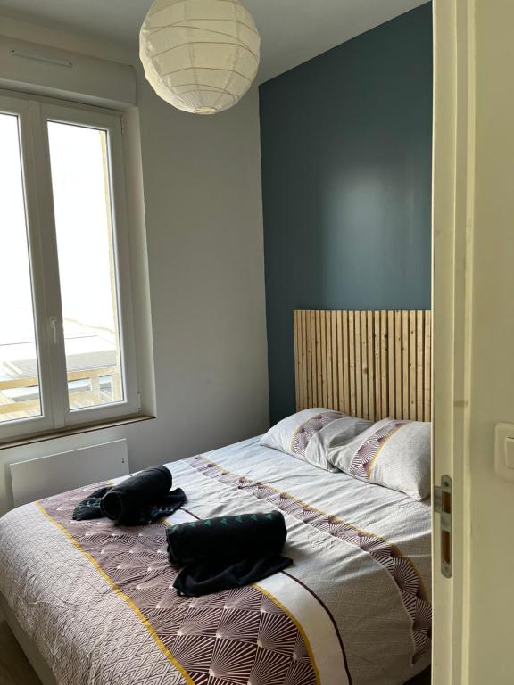 Posteľ alebo postele v izbe v ubytovaní La petite Boutique Bleue