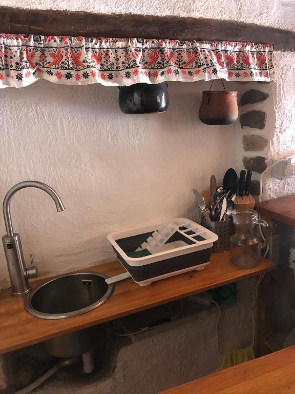 Kuchyň nebo kuchyňský kout v ubytování La casa della nonna