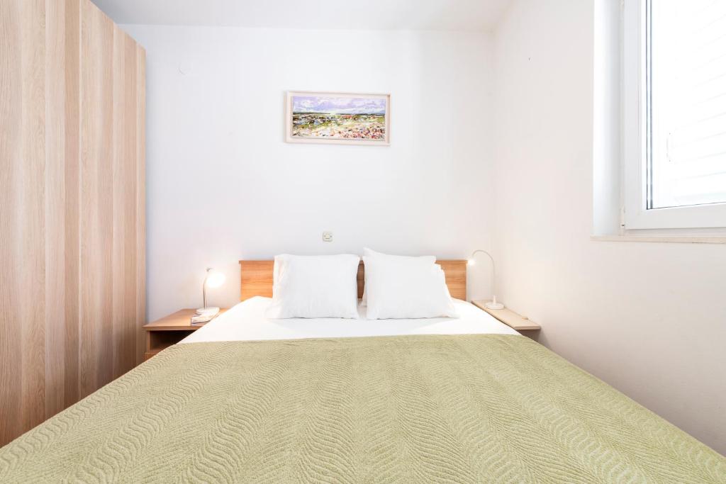 Posteľ alebo postele v izbe v ubytovaní Apartment Soulmate