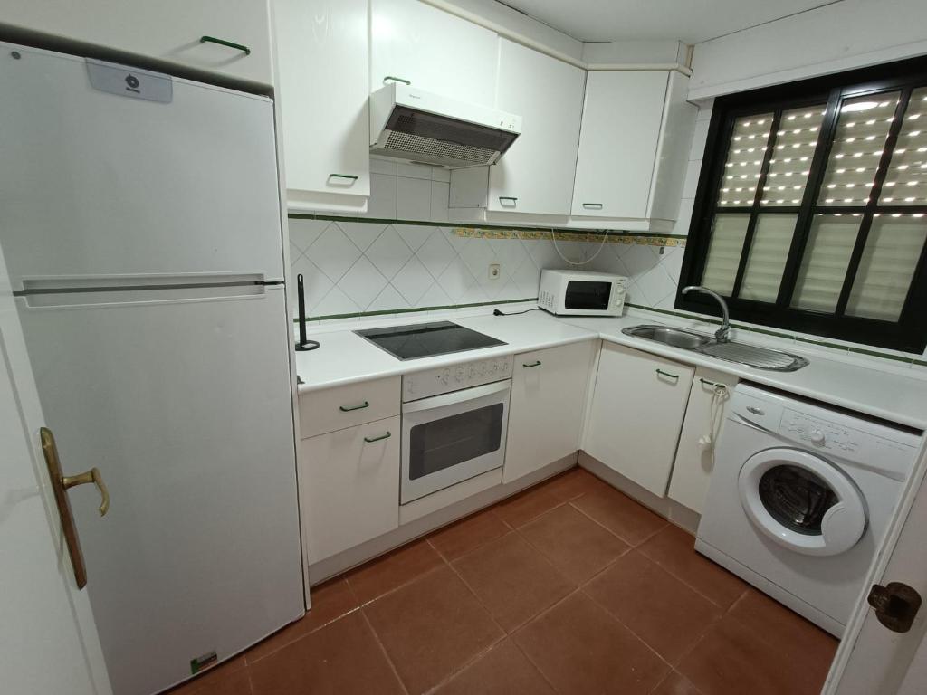 Kuchyň nebo kuchyňský kout v ubytování Urbanización Alcaudón premium by SIT ISLA CANELA