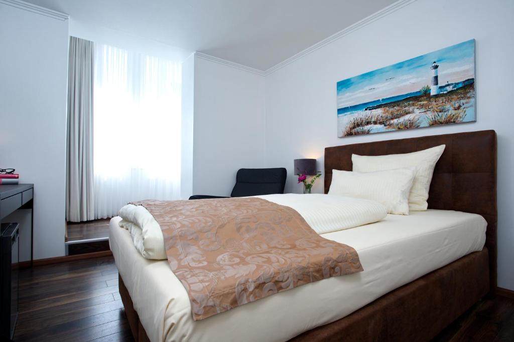 Postel nebo postele na pokoji v ubytování Hotel von Stephan