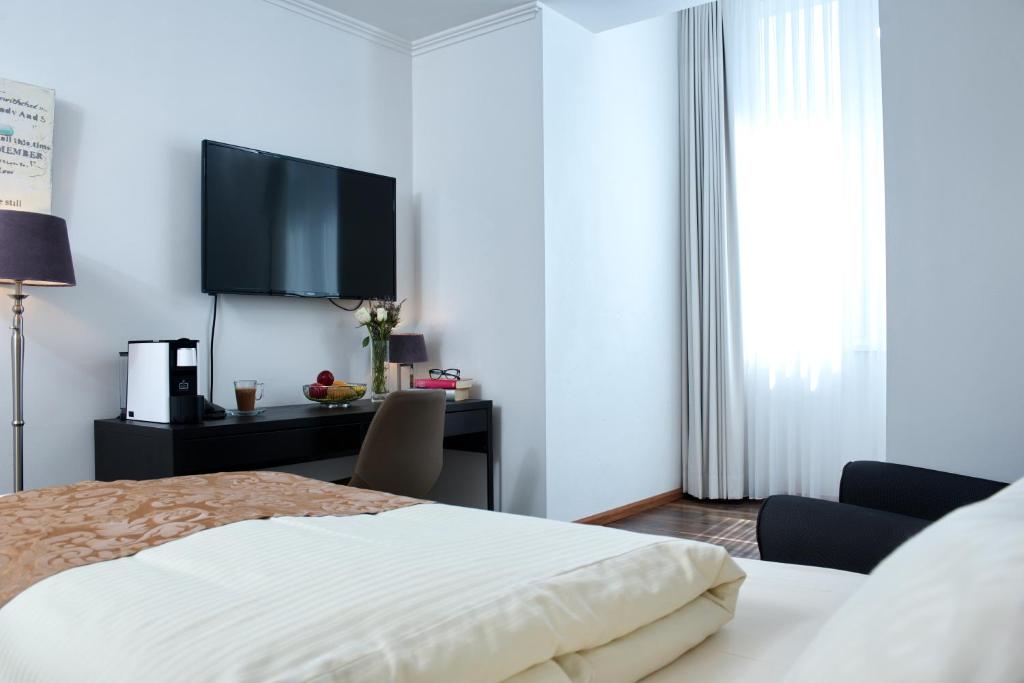 Postel nebo postele na pokoji v ubytování Hotel von Stephan