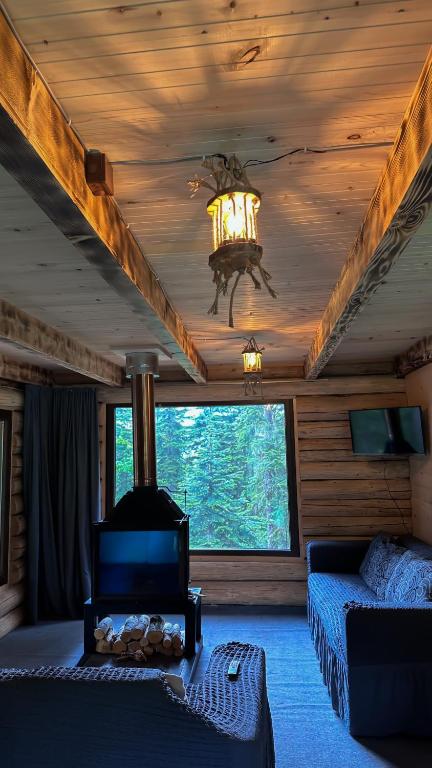 Postel nebo postele na pokoji v ubytování Hut In Hatsvali