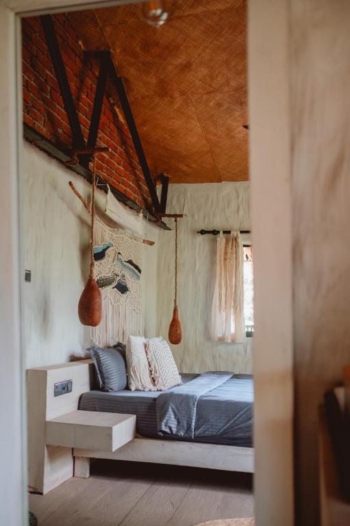 Postel nebo postele na pokoji v ubytování Arawe Retreat