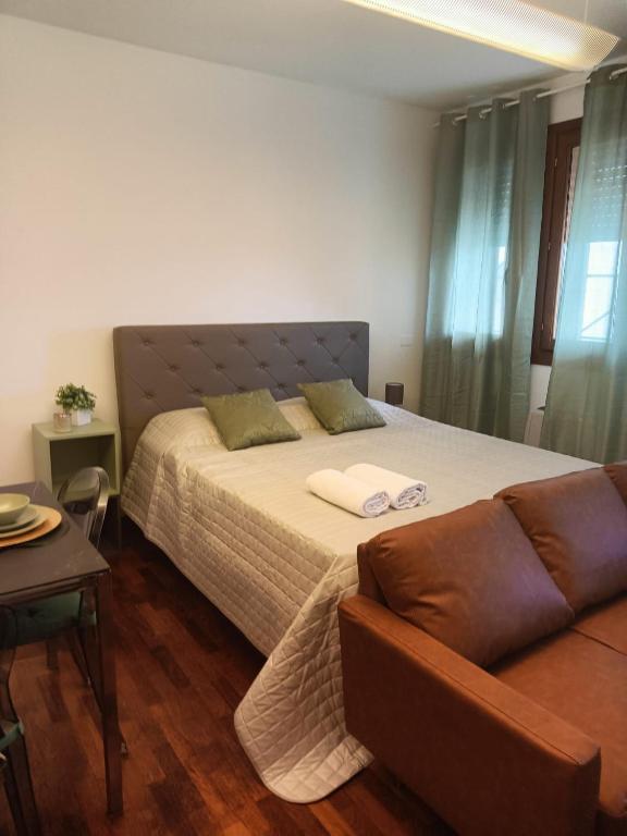 Postel nebo postele na pokoji v ubytování Suite Alle Corti - Treviso