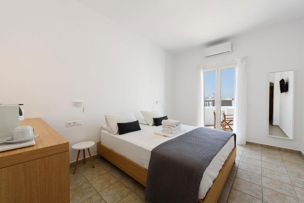 Postel nebo postele na pokoji v ubytování Hotel Bilia