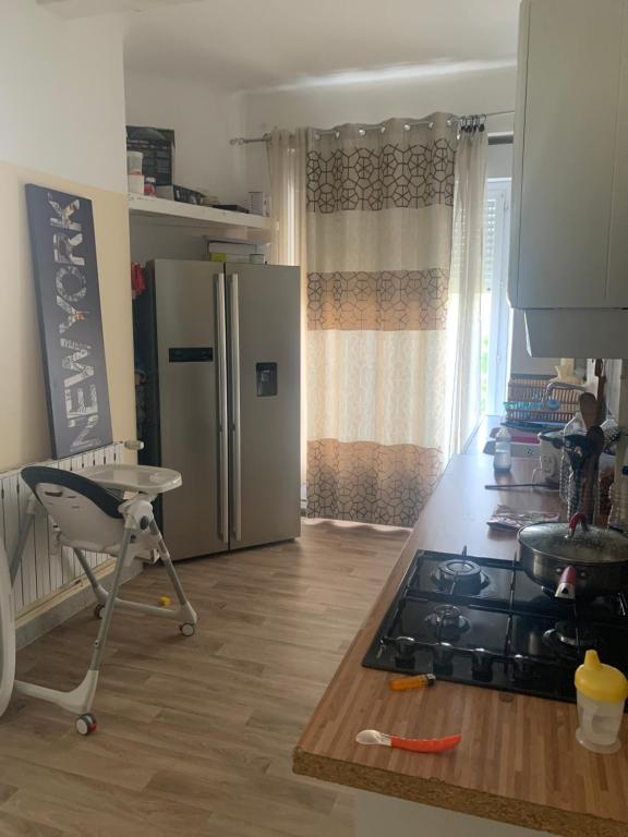 Kuchyň nebo kuchyňský kout v ubytování Chambre chez lhabitant