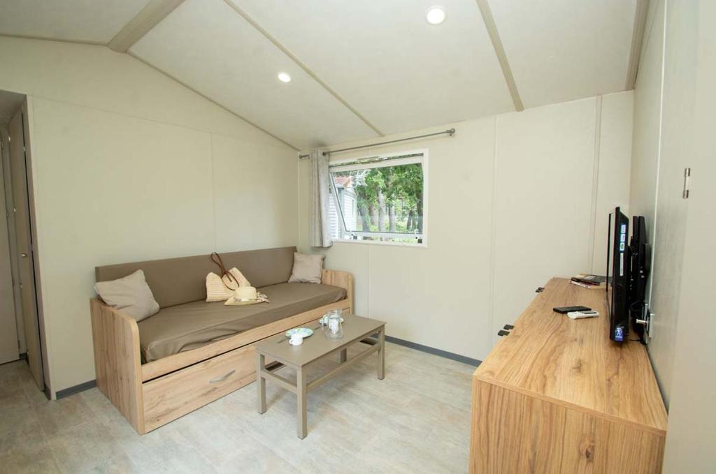 TV a/nebo společenská místnost v ubytování Parc Saint James Oasis Village