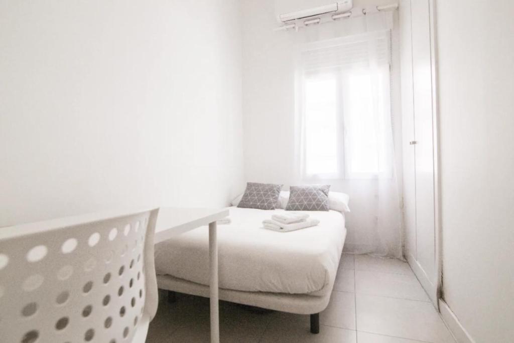 Postel nebo postele na pokoji v ubytování 3Dormitorios 2Baños -Malasaña-VELAR