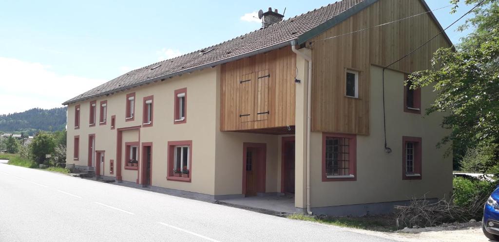 a building on the side of a road at Au val des meuris in Taintrux