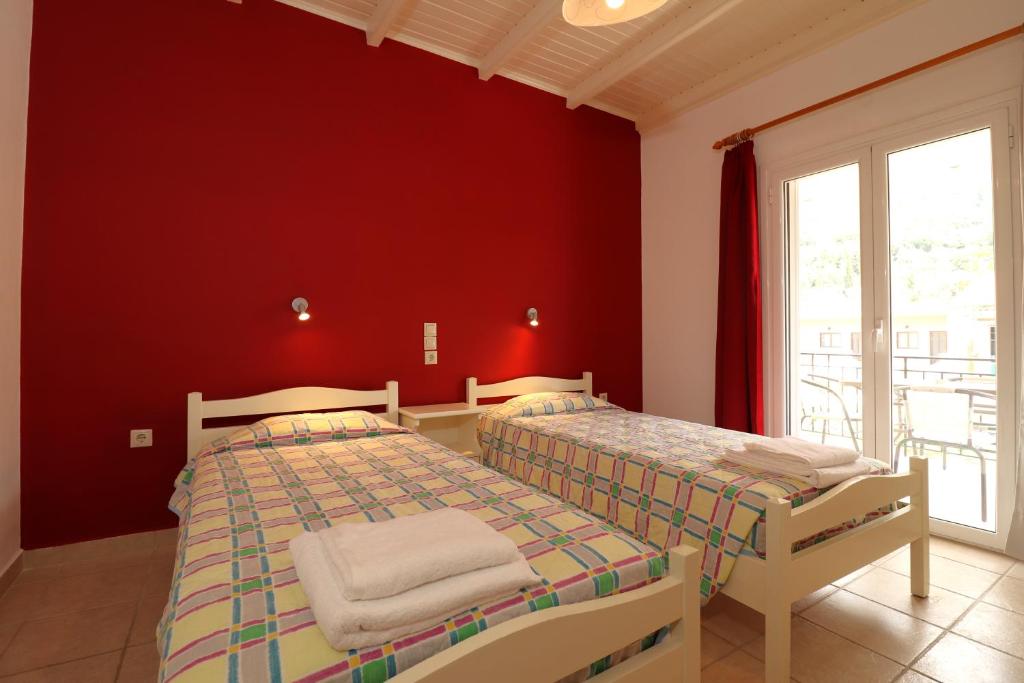 Postel nebo postele na pokoji v ubytování Dragana apartments