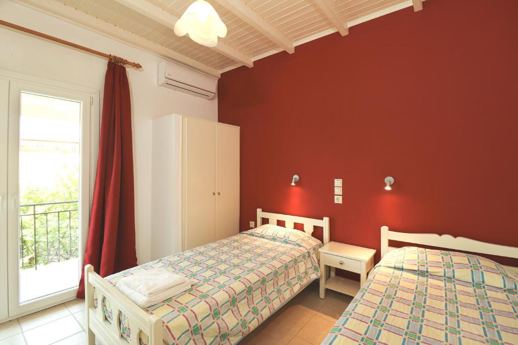 Postel nebo postele na pokoji v ubytování Dragana apartments