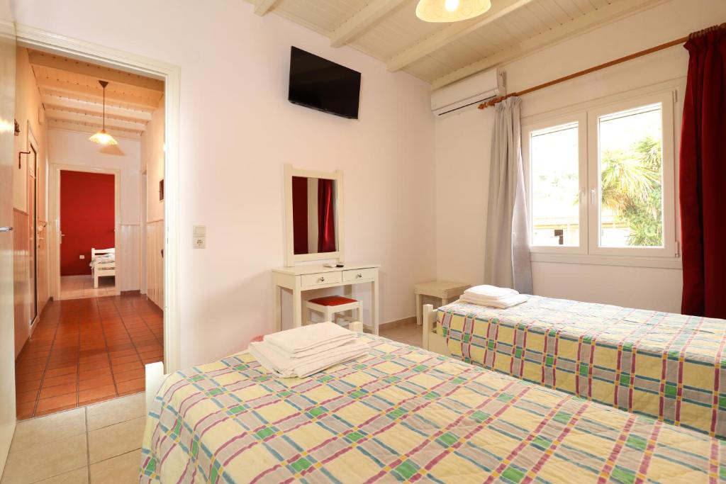 Postel nebo postele na pokoji v ubytování Dragana apartments