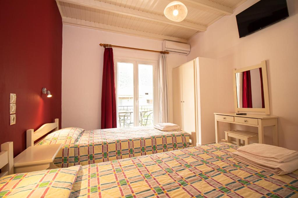 Postel nebo postele na pokoji v ubytování Dragana apartments