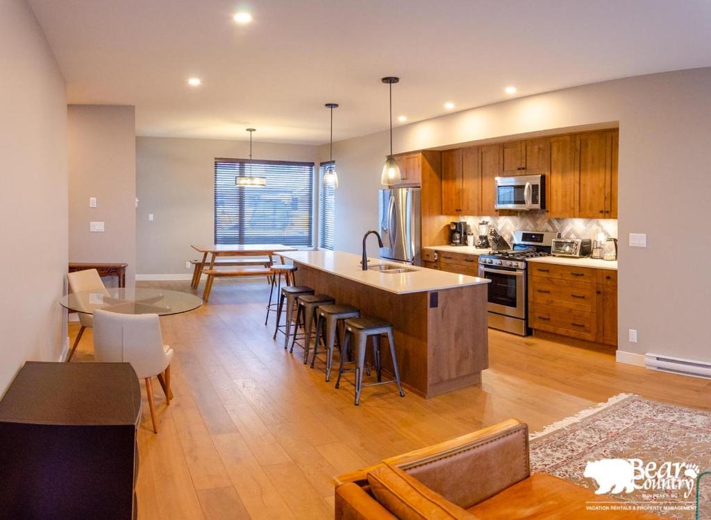 a kitchen with a large island in a room at Echo Landing #12 by Bear Country in Sun Peaks