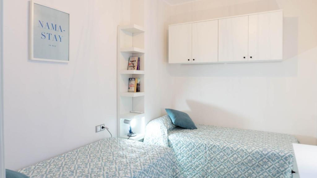 Postel nebo postele na pokoji v ubytování Luxury Apartment Dos Aceras