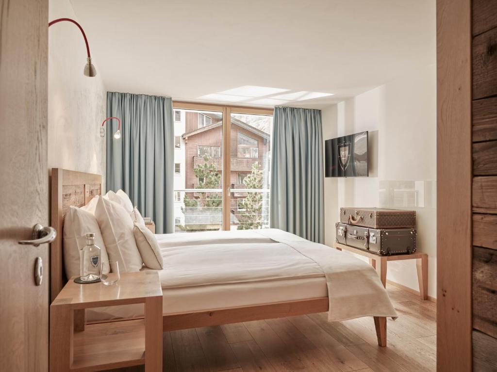 TV a/nebo společenská místnost v ubytování Firefly Luxury Suites