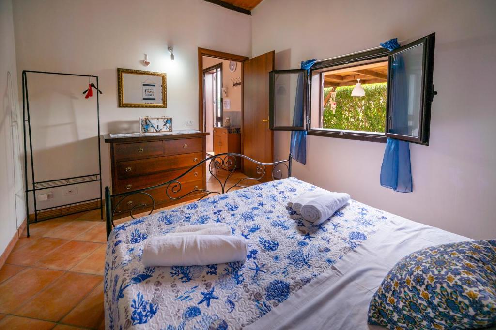 Postel nebo postele na pokoji v ubytování Casa carmen