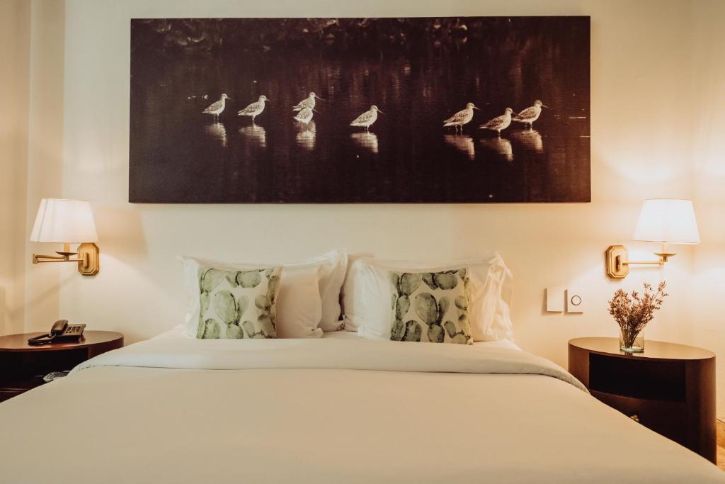 Ένα ή περισσότερα κρεβάτια σε δωμάτιο στο Hotel Boutique Santo Toribio
