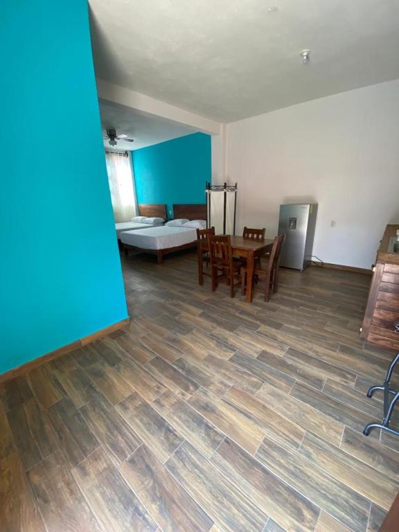 Postel nebo postele na pokoji v ubytování Casa Suites Minizoo