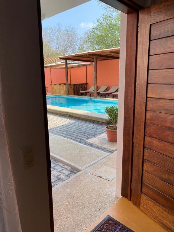 Bazén v ubytování Casa Suites Minizoo nebo v jeho okolí