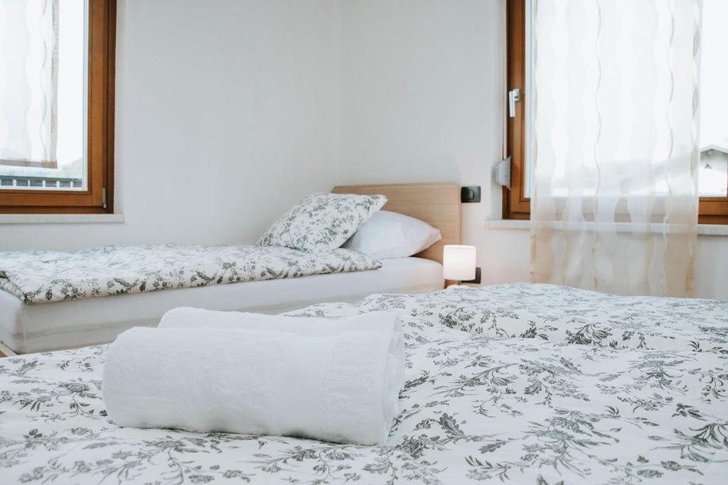 Postel nebo postele na pokoji v ubytování Apartmaji URŠIČ