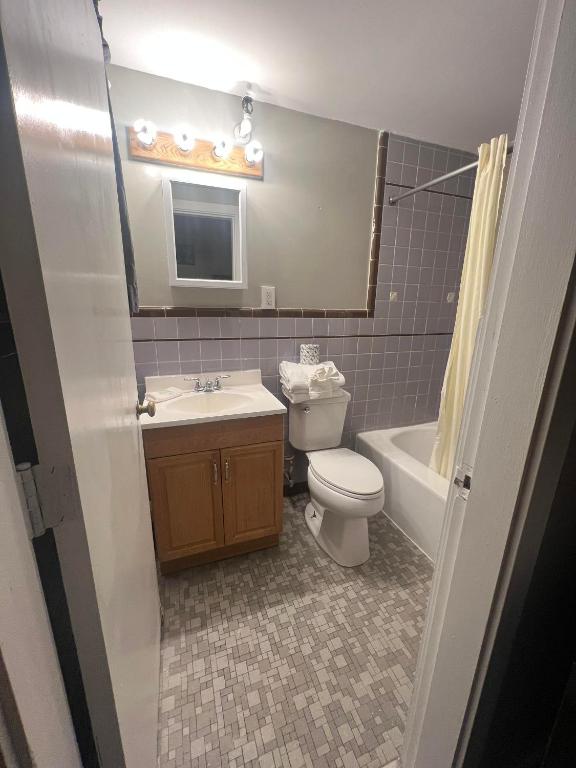 Vacationland Inn & Suites - Salle Quadruple économique