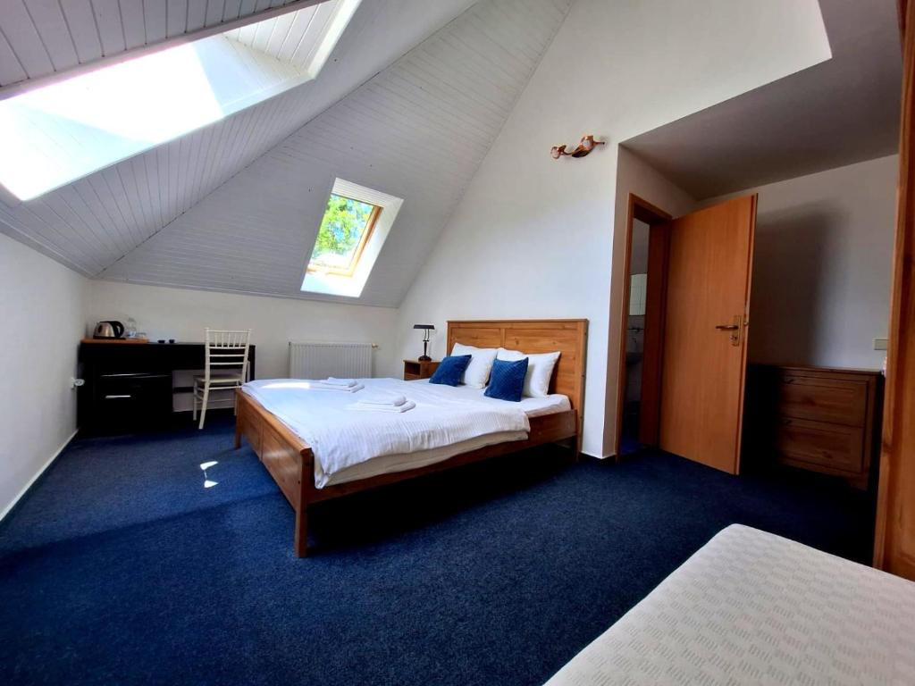 Postel nebo postele na pokoji v ubytování Vila Fenix B&B