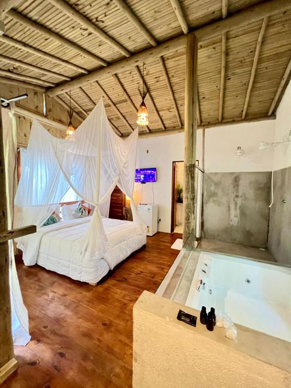 Postel nebo postele na pokoji v ubytování Villa Sagui Trancoso