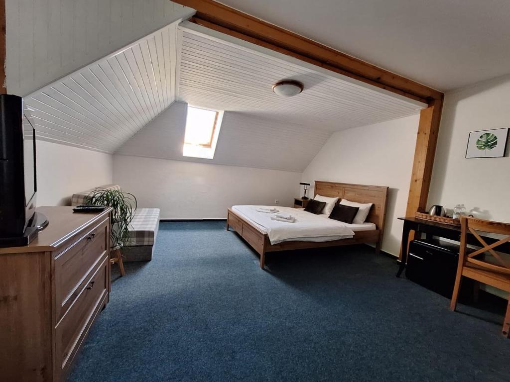 Postel nebo postele na pokoji v ubytování Vila Fenix B&B