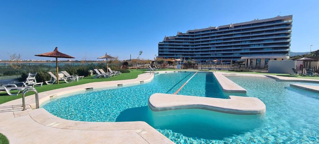 The swimming pool at or close to Vista de Flamencos