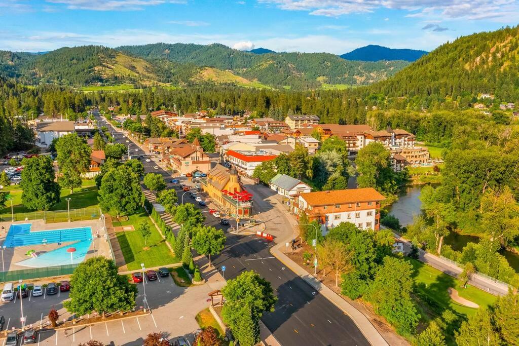 an aerial view of a town next to a river at Snowstorm Studio at Icicle Village with pool and hot tub in Leavenworth