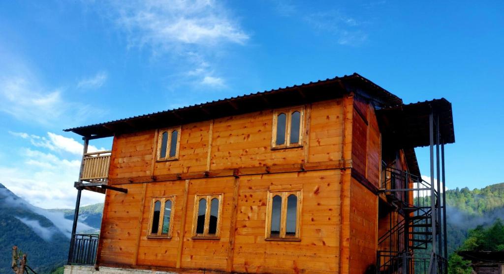 a wooden house is being built in the mountains at Wooden House Garetke in Batumi