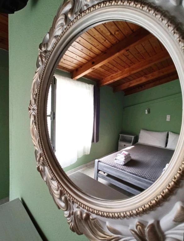Postel nebo postele na pokoji v ubytování Demis Apartments