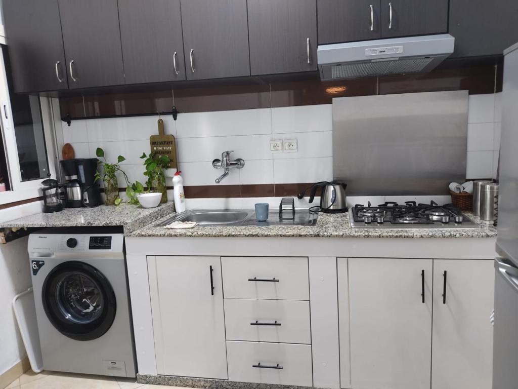 Kuchyň nebo kuchyňský kout v ubytování Moderne appartement