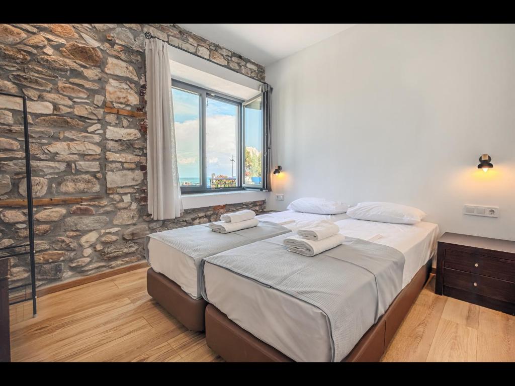 Letto o letti in una camera di DreamStone Residence