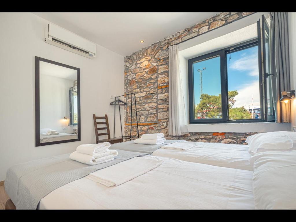 Letto o letti in una camera di DreamStone Residence
