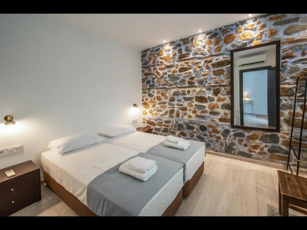 Letto o letti in una camera di DreamStone Residence
