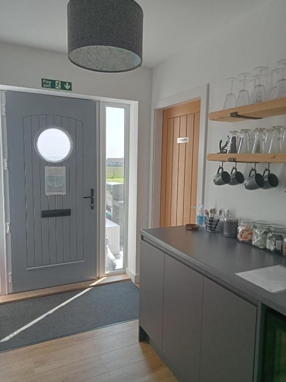Kuchyň nebo kuchyňský kout v ubytování Flotnar Hús - Modern B&B